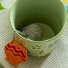Teesieb „Flower pots“ aus Keramik/Metall
